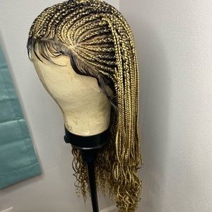 Lace frontal braided wig. Fits All size head. Color is honey blonde(#27)